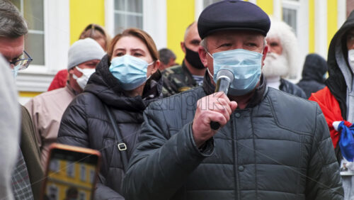 Video - CHISINAU, MOLDOVA - APRIL 28, 2021: Man talking in the microphone. People protesting for snap elections in front of constitutional court building