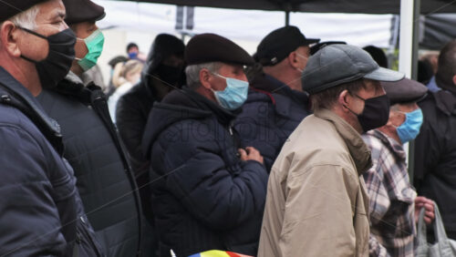 Video - CHISINAU, MOLDOVA - APRIL 28, 2021: People protesting for snap elections in front of constitutional court building. Slow motion