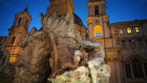 Video - Fountain of the Four Rivers located in Navona square. Rome city square at sunset. Italy