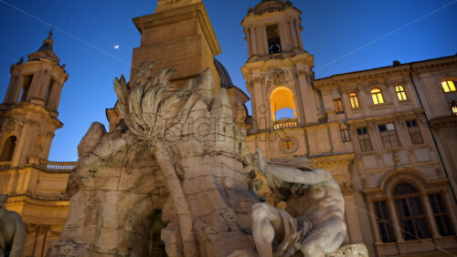 Video - Fountain of the Four Rivers located in Navona square. Rome city square at sunset. Italy