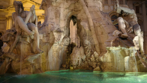Video - Fountain of the Four Rivers located in Navona square. Rome city square at sunset. Italy