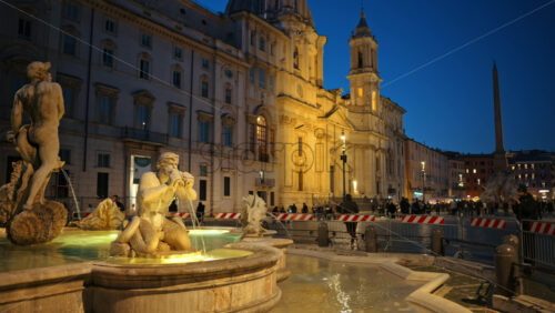 Video - Rome, Italy - February 13, 2024: Fountain of the Moor located in Navona square. City square at sunset