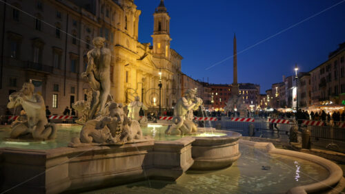 Video - Rome, Italy - February 13, 2024: Fountain of the Moor located in Navona square. City square at sunset
