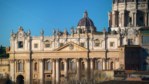 Video - Aerial view of Vatican city from the distance. Saint Peter's Basilica at sunset. Rome, Italy