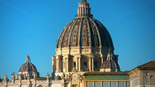 Video - Aerial view of Vatican city from the distance. Saint Peter's Basilica at sunset in Rome, Italy