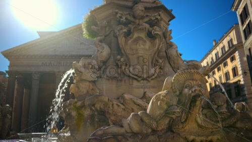 Video - Close up view of the Fountain of the Pantheon in sunlight. Slow motion