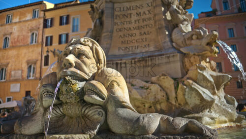 Video - Close up view of the Fountain of the Pantheon in sunlight. Slow motion