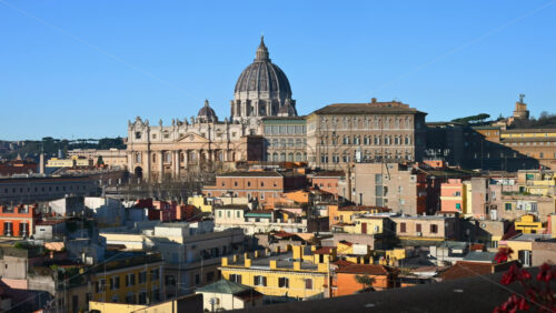 Video - Vatican city from the distance with Saint Peter's Basilica at sunset. Zoom in effect. Rome, Italy