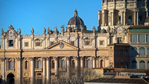 Video - Aerial view of Vatican city from the distance. Saint Peter's Basilica at sunset. Rome, Italy