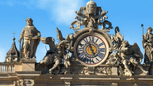 Video - Close up of one of two clocks atop of Saint Peter's Basilica facade, Vatican City, Rome, Italy