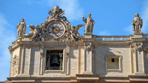 Video - Close up of one of two clocks atop of Saint Peter's Basilica facade, Vatican City, Rome, Italy