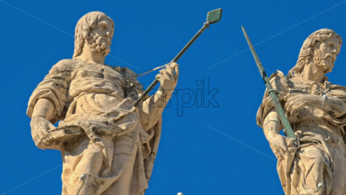 Video - Statues on the Facade of St. Peter's Basilica on the blue sky background, in St. Peter's Square, Vatican City, Rome, Italy