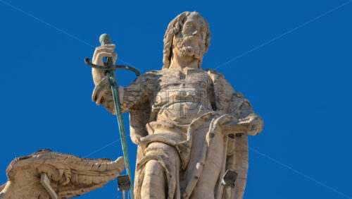 Video - Statues on the Facade of St. Peter's Basilica on the blue sky background, in St. Peter's Square, Vatican City, Rome, Italy