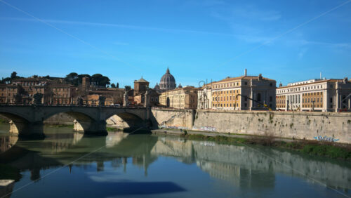 Video - Rome, Italy - February 15, 2024: Ponte Sant'Angelo across River Tiber with city view on the background