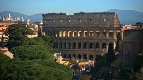 Video - Distant view of the Colosseum with city view in the background, Rome, Italy