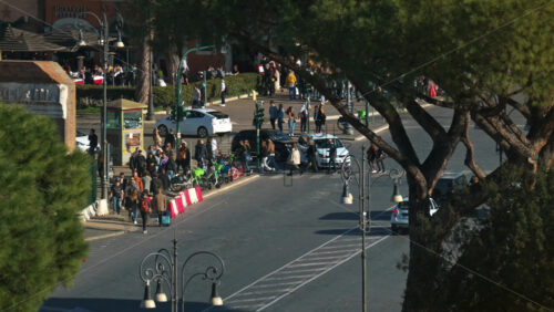 Video - City street view of Rome in daylight, with people walking on the background, Italy