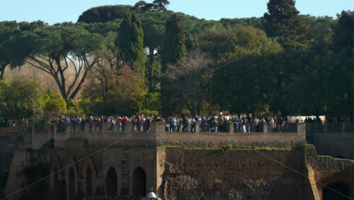 Video - Bridge view in daylight, with people walking on the background, Rome, Italy