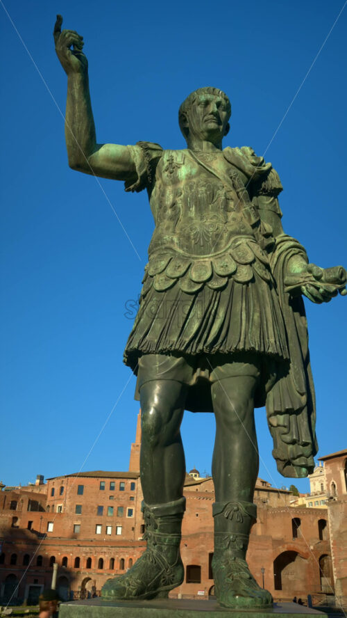 Video - Vertical shot of Julius Caesar statue at sunset in Rome, Italy