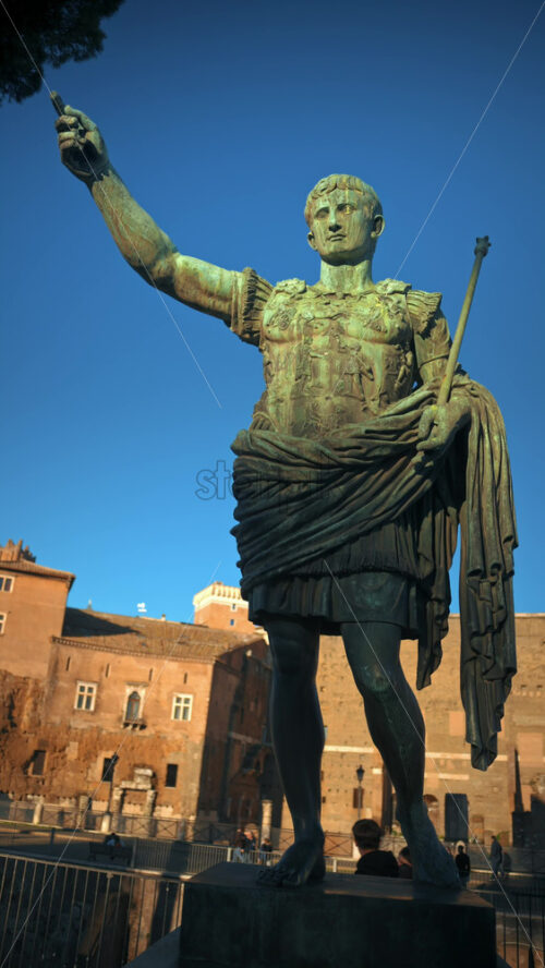 Video - Vertical shot of Julius Caesar statue at sunset in Rome, Italy