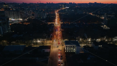 Video - Aerial drone view of Chisinau city with moving traffic at sunset