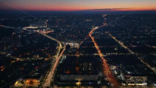 Video - Aerial drone view of Chisinau city with moving traffic at sunset
