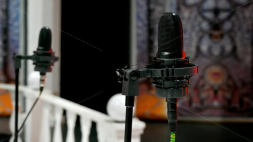 Video - Two microphones on the backstage of a TV set