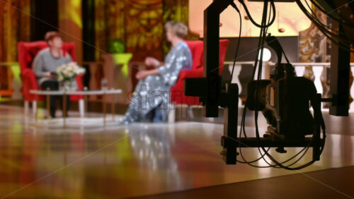 Video - Professional camera filming a show on the backstage of a TV set
