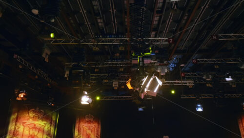 Video - Flashing studio lights equipment on the ceiling of a TV set