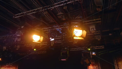 Video - Flashing studio lights equipment on the ceiling of a TV set