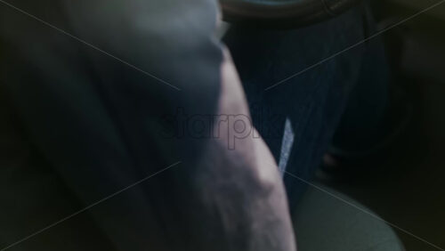 Video - Man holding mask, passport and smartphone with International Vaccination Certificate COVID-19 QR code in a car and going out