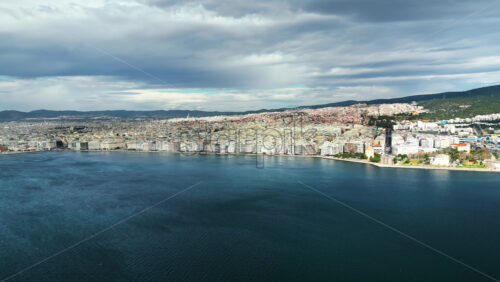 Video - Aerial drone view of Thessaloniki coastline. Blue sky. The Aegean Sea in Central Macedonia in Greece