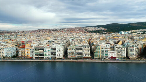 Video - Aerial drone view of Thessaloniki coastline. Blue sky. The Aegean Sea in Central Macedonia in Greece