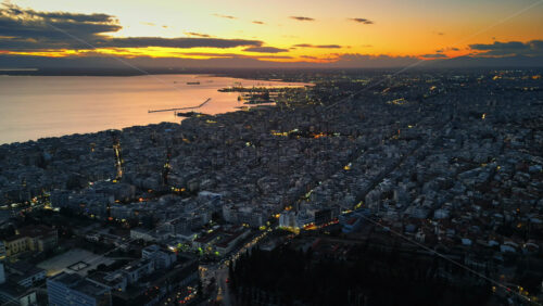 Video - Aerial drone view of Thessaloniki coastline at the sunset. The Aegean Sea in Central Macedonia in Greece
