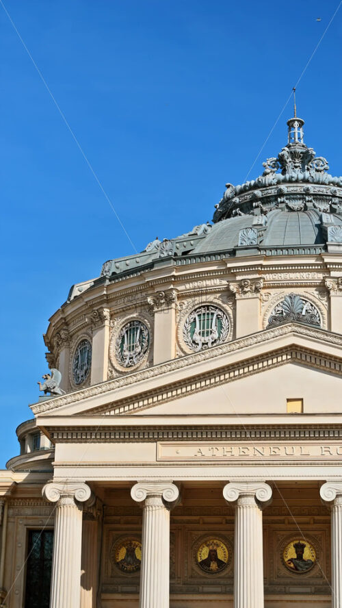 Video - The Romanian Athenaeum at sunset. Panoramic view. Vertical shot. Bucharest, Romania