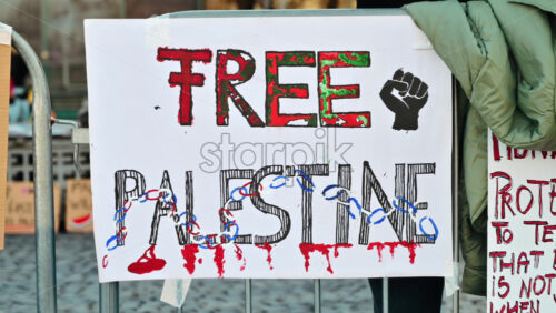 Video - Bucharest, Romania - March 02, 2024: Political poster that advocates for the Palestinian people to have a self-determined state