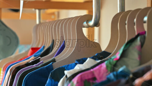 Video - Interior of an eco-friendly shop with clothes hang on brown paper hangers