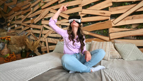 Video - Woman enjoying looking through VR headset