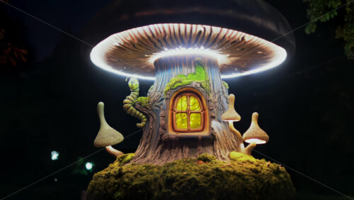Video - A miniature fantasy tree house with glowing windows, mushrooms, and a smiling caterpillar figure