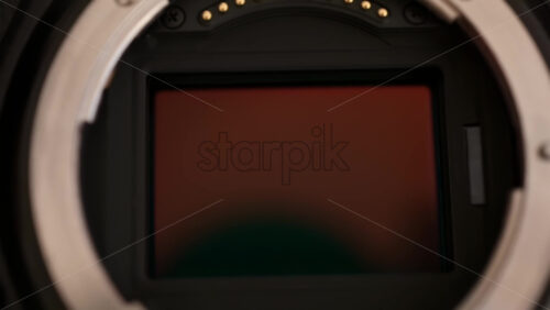 Video - Close up view of a digital camera shutter opening