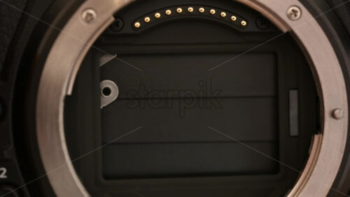 Video - Close up view of a digital camera shutter opening