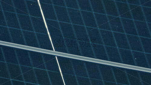 Video - Close up of modern solar panels capturing sunlight with geometric precision