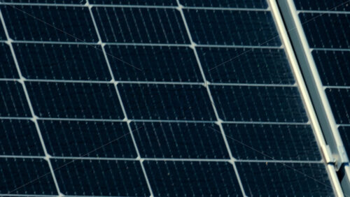 Video - Close up of modern solar panels capturing sunlight with geometric precision