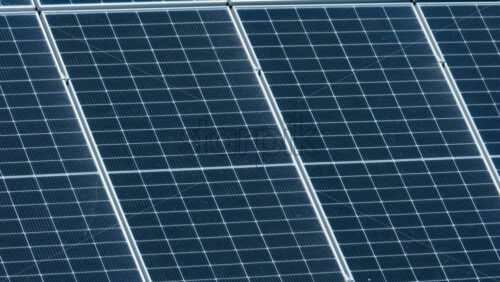 Video - Close up of modern solar panels capturing sunlight with geometric precision