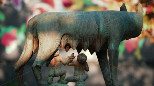 Video - Chisinau, Moldova - September 25, 2025: Historic bronze statue of the Capitoline Wolf with Romulus and Remus on a red marble pedestal in front of the National History Museum of Moldova