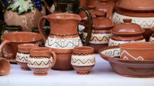 Video - Traditional pottery crafting at a lively market. Artisans showcase their traditional Moldavian designs