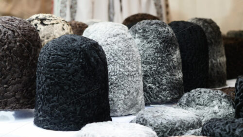 Video - Handcrafted national Moldavian and Romanian Cusma hats at an artisan market. Shepherd's hat, made from sheep wool.