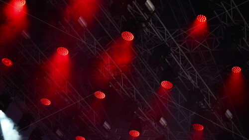 Video - Lively lights and smoke effects at a music festival in the summer evening. Stage lighting