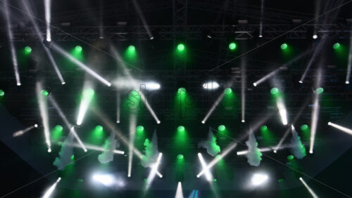 Video - Dynamic light show highlights vibrant stage setup for outdoor concert