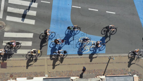 Video - Copenhagen, Denmark - August 6, 2025: Aerial drone view of cyclists filling Copenhagen's bike lanes during a busy day