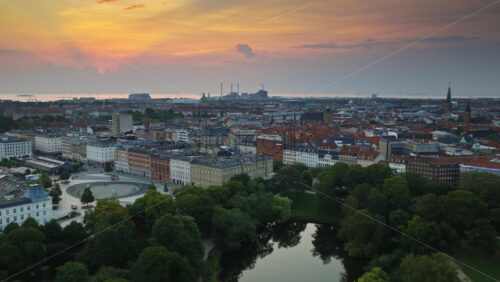 Video - Aerial drone view over Orstedsparken and colorful street art mural in the city center